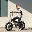 Eletronbike_OD20_Foldable_ebikes-Black_commuter_riding.webp